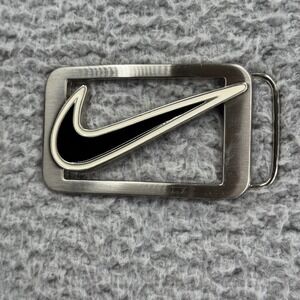Nike Golf Nike Swoosh Logo Cut Out Metal Belt Buckle Silver Black 2" x 3.25"